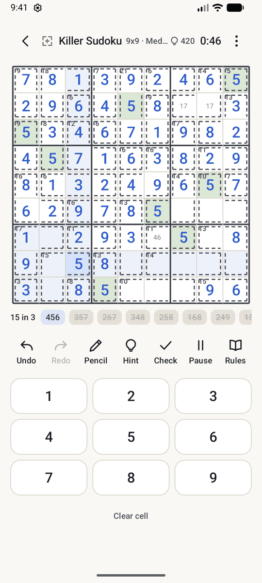 A part-solved Killer Sudoku: cages, entered digits, pencil marks in one region and the keypad up